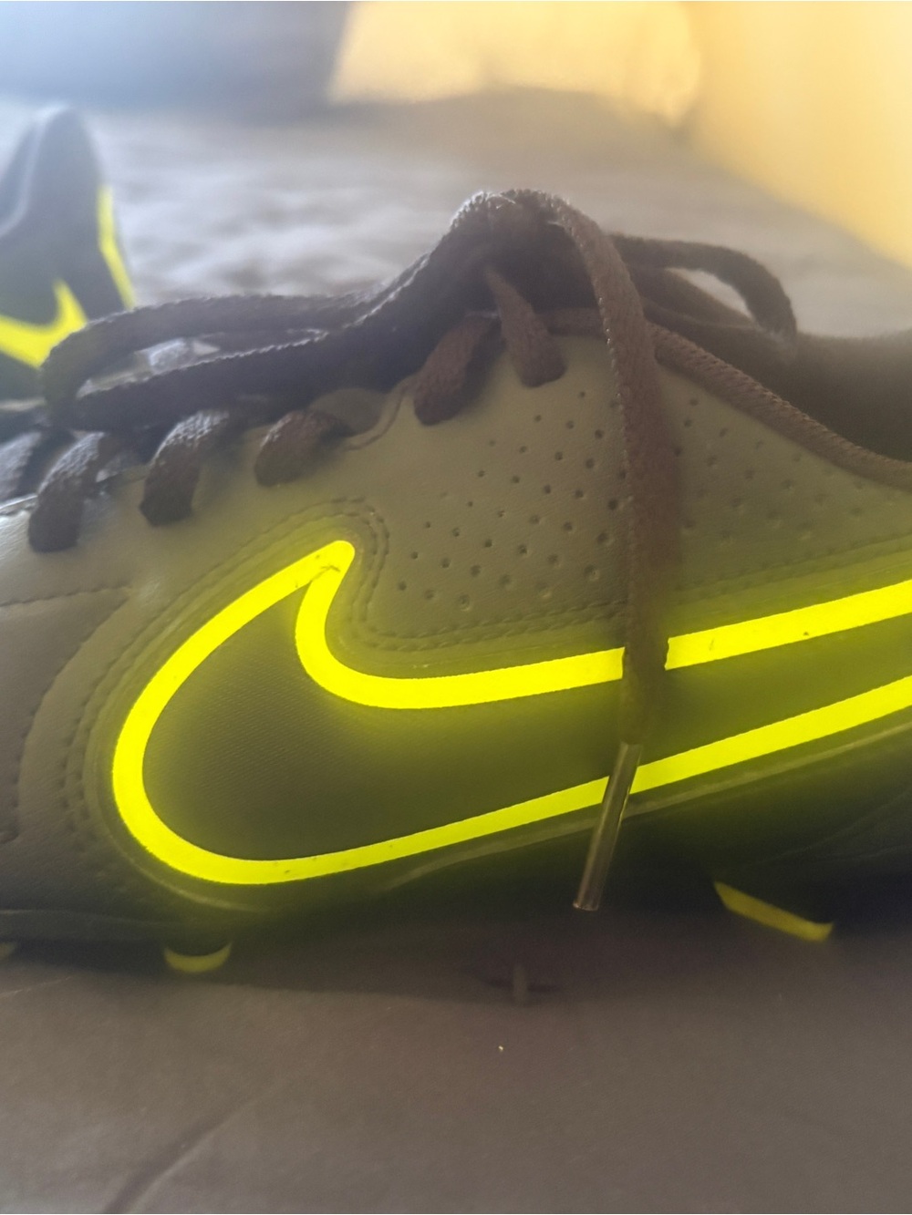 Nike Kids Black Soccer Cleats with Neon Yellow Swoosh